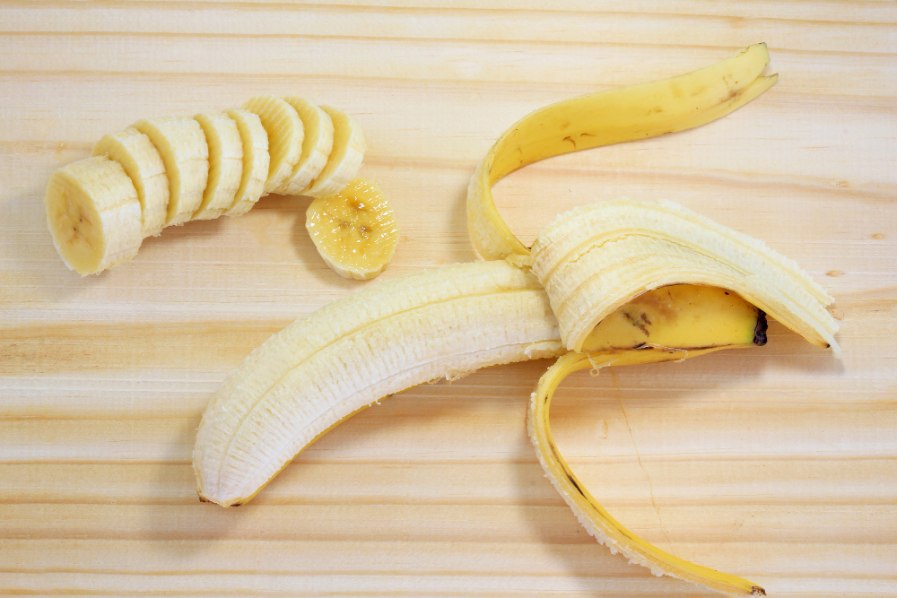 peeled-banana-wood-sliced-banana-top-view