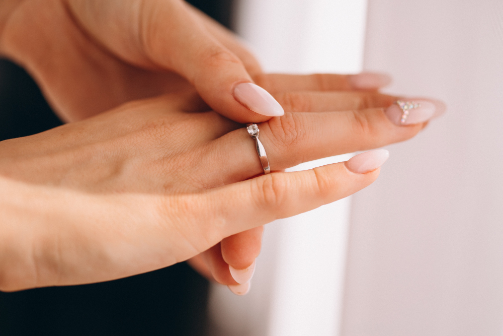 female-hands-close-up-with-wedding-ring