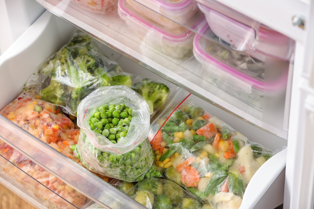 plastic-bags-with-frozen-green-peas-different-vegetables-refrigerator