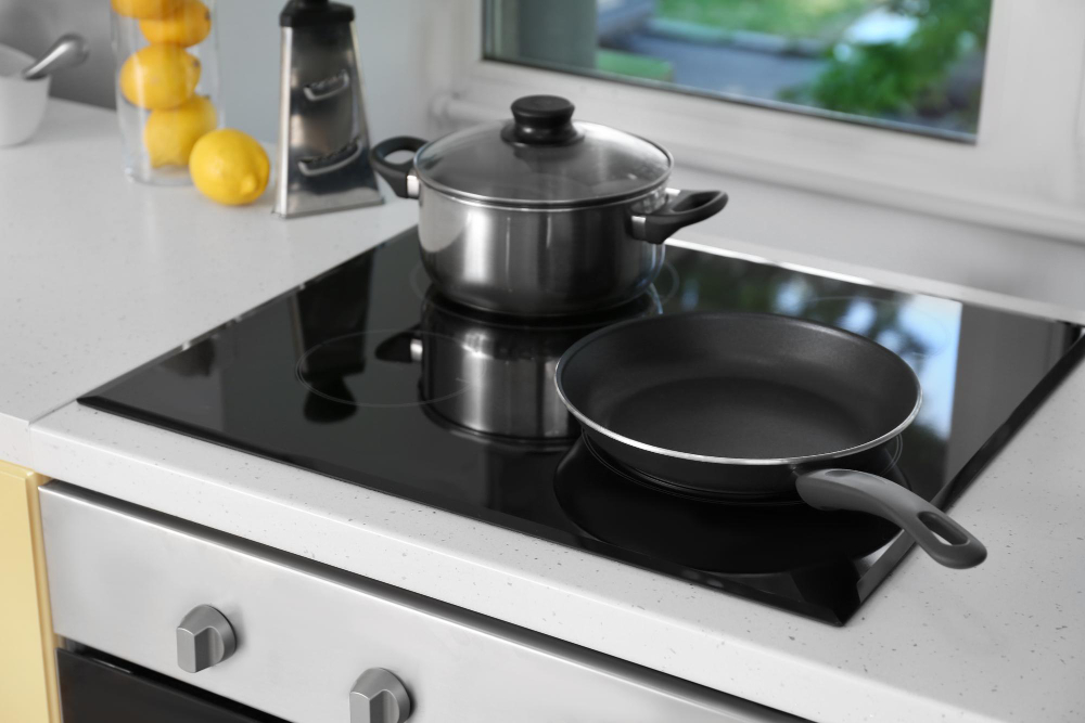 electric-stove-with-cooking-utensils-kitchen
