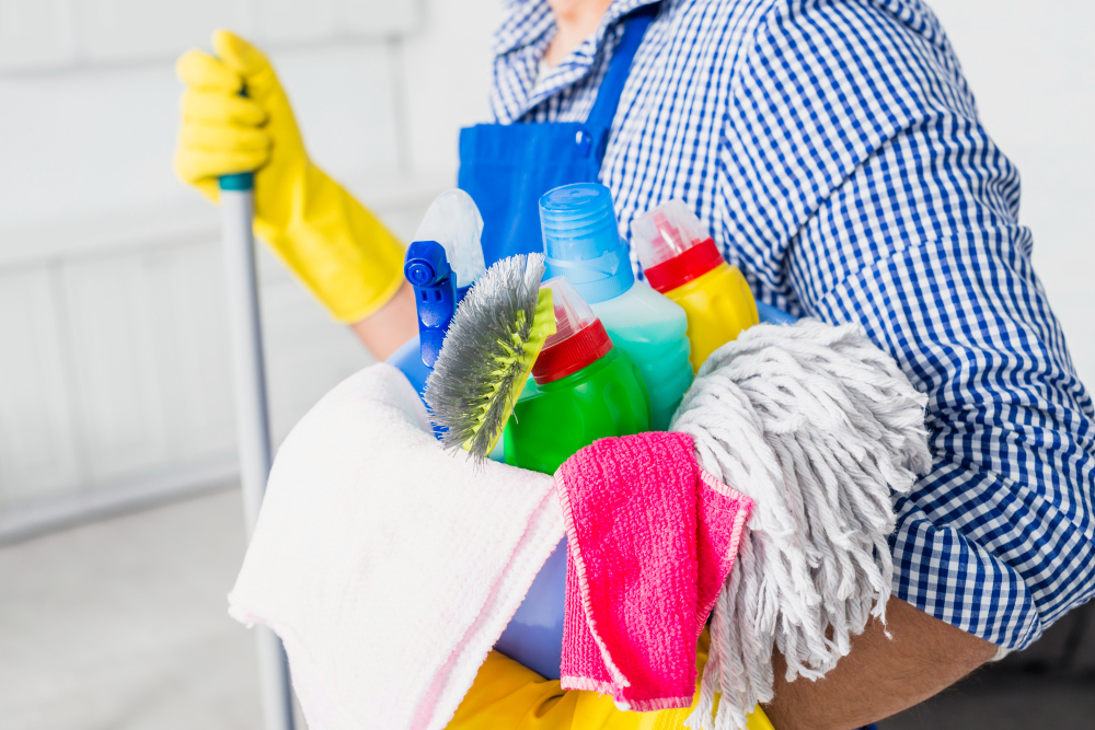 man-with-cleaning-products