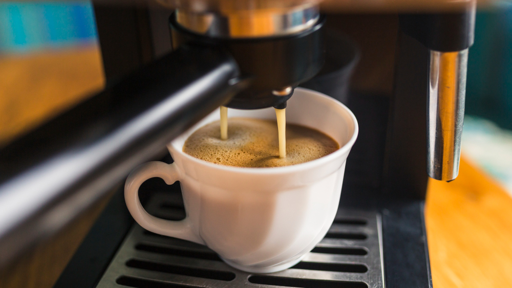 coffee-with-frothing-pouring-from-espresso-machine