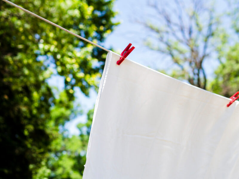 Close Up White Sheet Drying Line
