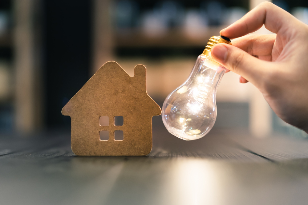 Light Bulb With Wood House Table