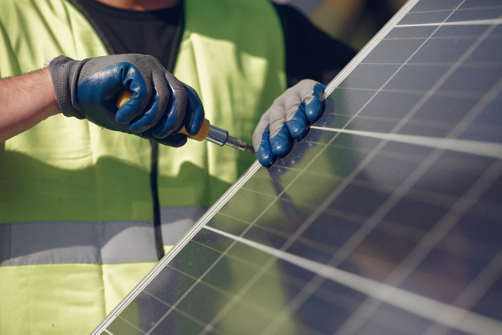 Man With White Helmet Near Solar Panel