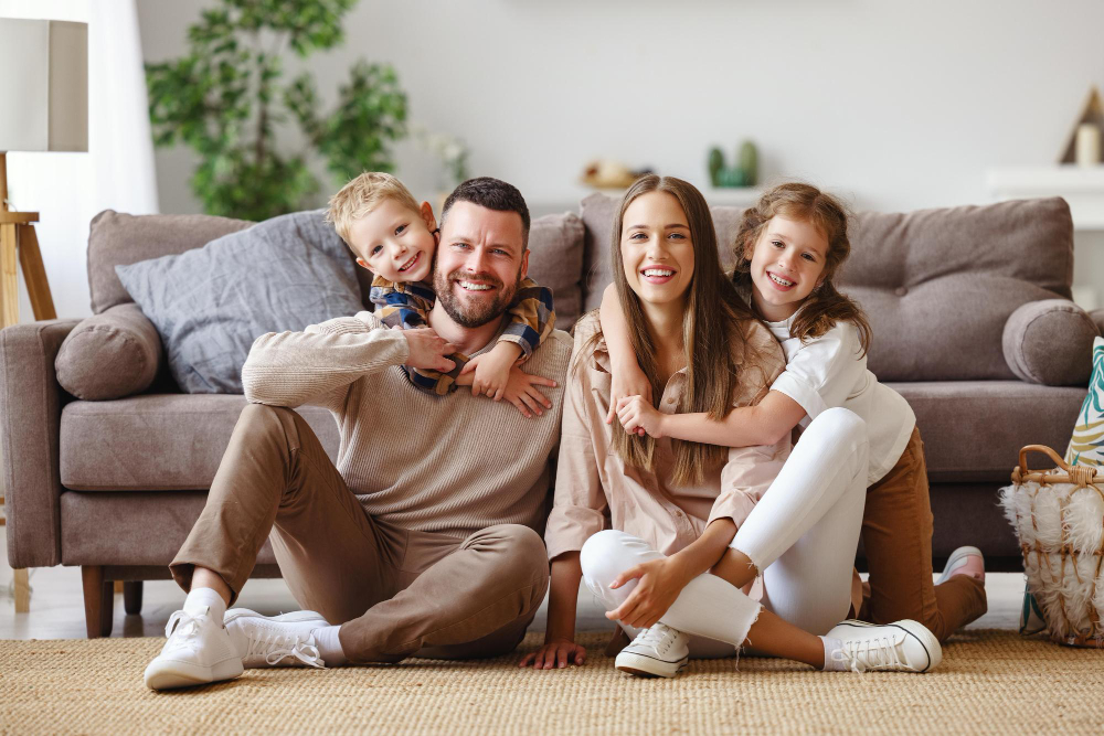 Happy Family Mother Father Children Home Couch