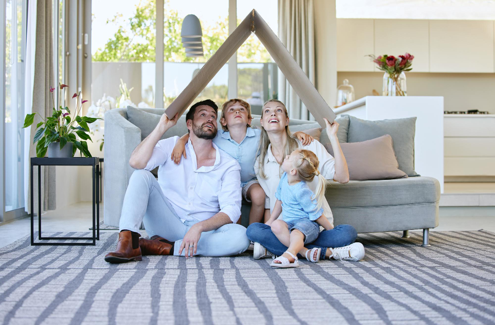 What You See When You Look Up Full Length Shot Affectionate Family Four Holding Cardboard Roof Their Heads While Sitting Living Room Home