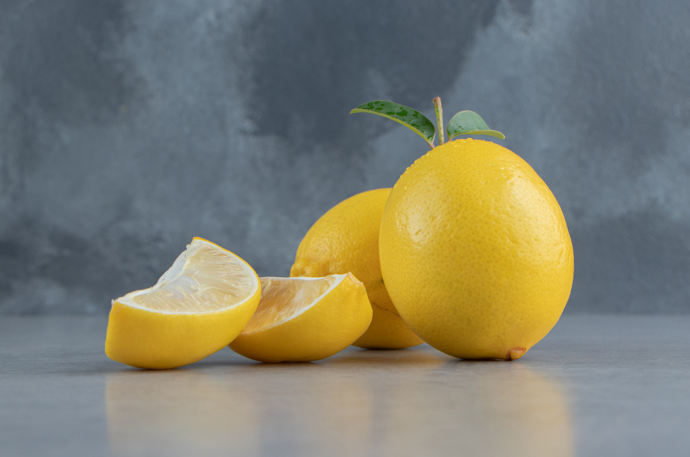 Whole Sliced Lemons Displayed Marble