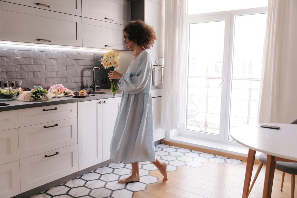 Full View Happy Woman With Flowers Home