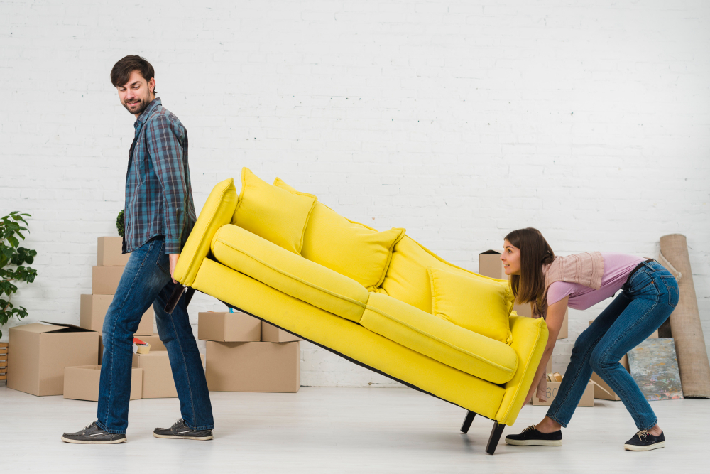 Couple Trying Place Yellow Sofa Their New House