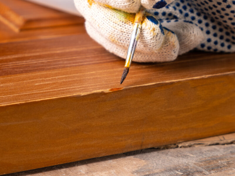 restoration-wooden-door-close-up-repairing-scratches-wood-surface
